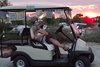 Hanni and Deb in Golf Cart at Sunset