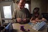 Granddad and Addie doing crafts together in Marietta, GA