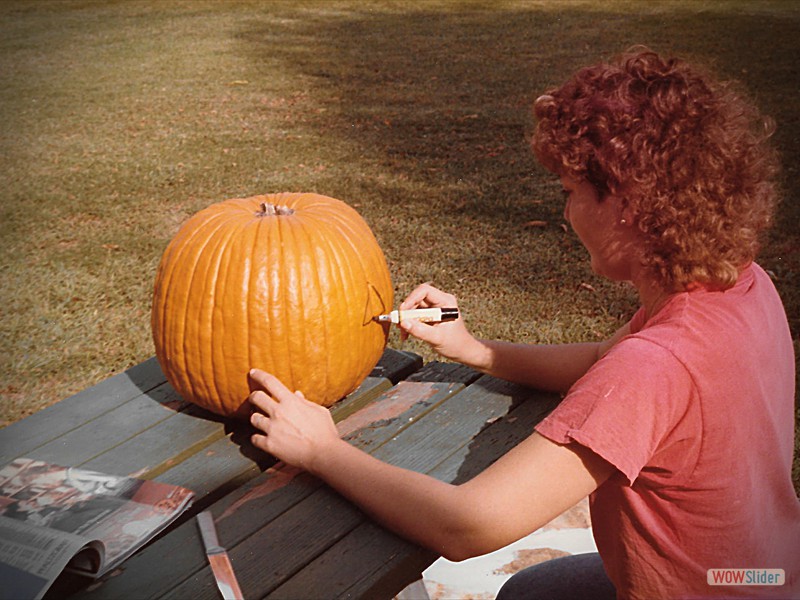 Deb preparing to carve pumpkin